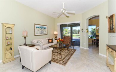 The living room features tile flooring on the diag