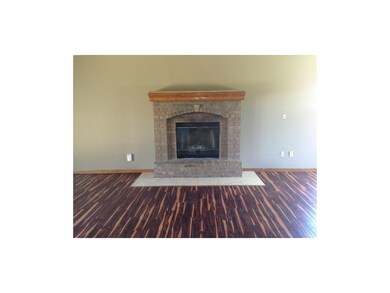 Spectacular brick fireplace and newer flooring