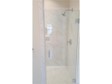 Frameless shower door in Master Bath