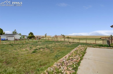 View of yard with a rural view and  patio