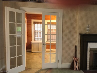 french door entry to family room/office/sun room