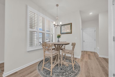 Dining room featuring light hardwood / wood-style 