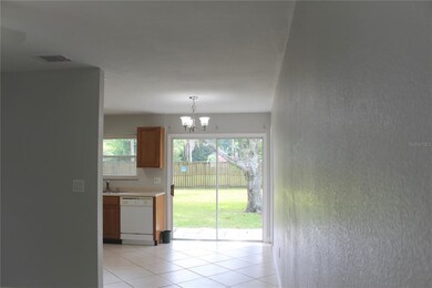 Family room looking into eat in kitchen and kitche