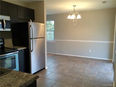 View of Dining area off Kitchen with Ceramic Tile 