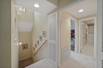 note at top of stairs coat closet. views of 2nd be