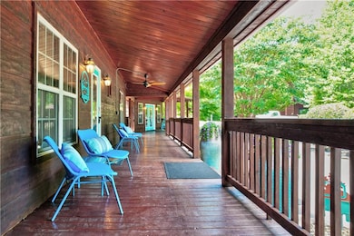 Wooden porch with ceiling fan