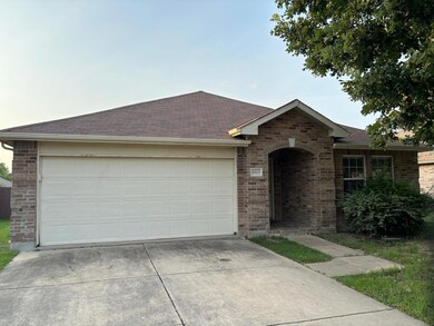 Ranch-style house with a garage
