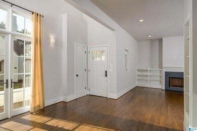 soaring ceilings in dining room, not visible in ph