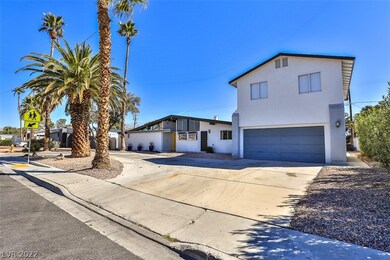 Front of house, garage and attached casita.