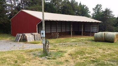 Sturdy, large equipment shed, well pump and electric pole