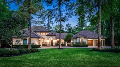 This beauty sits on just over an acre.