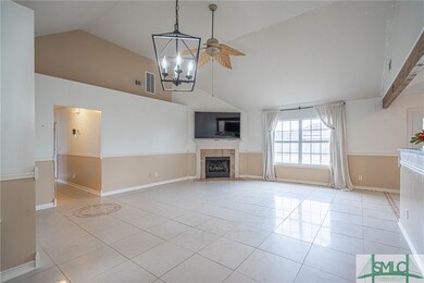 OPEN CONCEPT GREAT ROOM WITH GAS FIREPLACE AND CAT