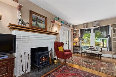 Fireplace, original floors, beautiful doors