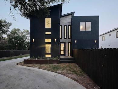 Contemporary home with stone siding and stucco siding