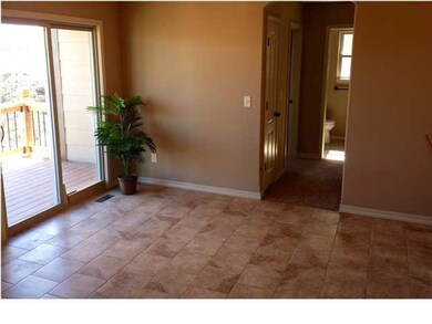 Ceramic tile dining room floor.