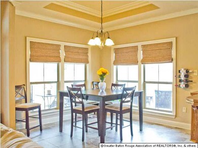 Light and bright dining area with back yard views