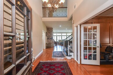 As you enter you will see an inviting 2 story high