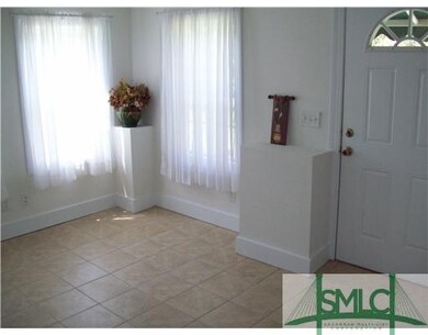 Dining Room. Dining Room w/ matching tile and a lo