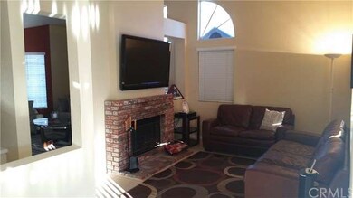Family Room with fireplace and prewired for flat s