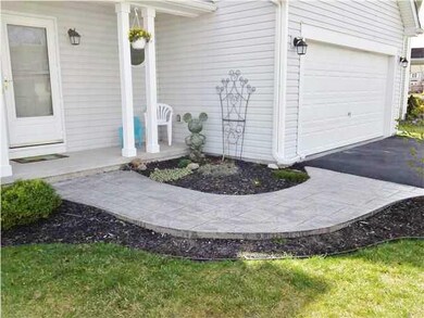 Exterior Front. The beautiful front walkway means 