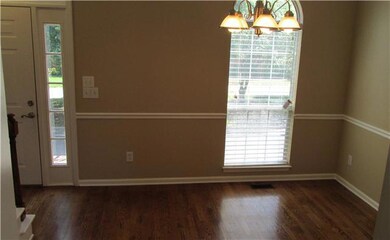 Formal Dining Room adjacent to foyer and Kitchen