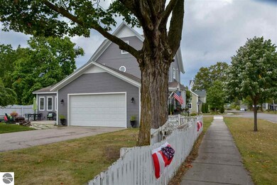 302 Spruce St, Elk Rapids, MI 49629 - photo 7