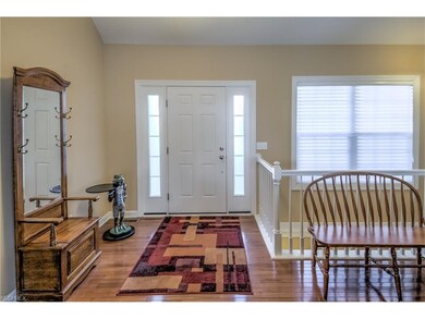 Wood Foyer and open stairwell to lower level