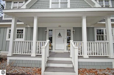 The gracious front porch inviting guests!