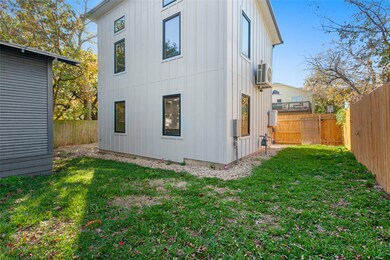 Back of property featuring board and batten sidin