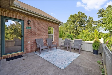 This patio home is situated adjacent to the wooded area
