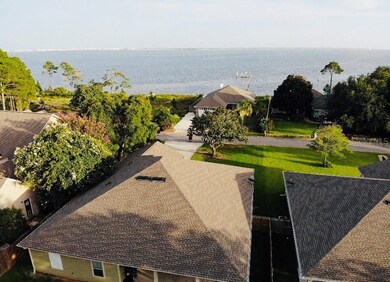 ARIEL VIEW FROM BACK OF HOUSE TO THE SOUND