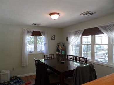Dining area with Huge windows and great daylight.