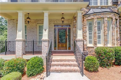 Front porch with custom Iron door