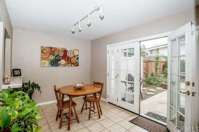 Wonderful dining room area with French doors leadi