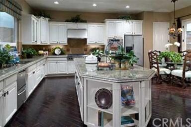 The picture is of a model home and does not direct