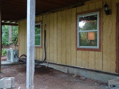 Basement Entrance Beneath Back Deck