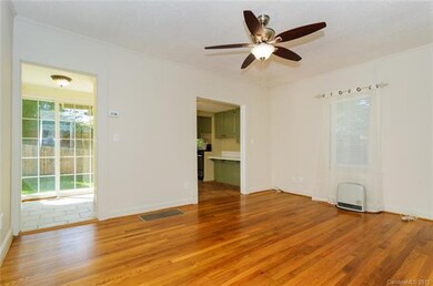 Living Room Opens To Sunroom, Kitchen And Back Yar