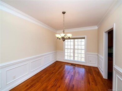 Dining Area With Wainscot and Chair Rail And Crown