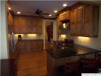 Dream kitchen has granite countertops, lots of cab