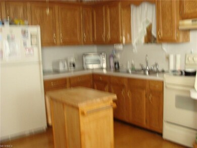 kitchen has ample cabinets & appliances
