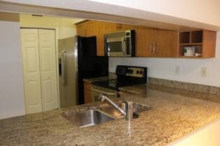 6511 Emerald Dunes Dr unit 204, West Palm Beach, FL 33411 - photo 2