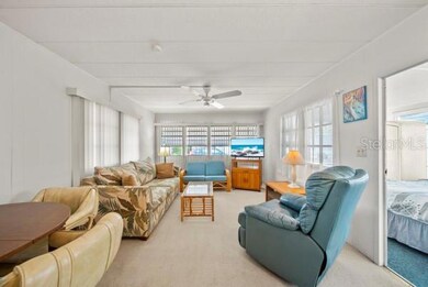 LOOKING INTO LIVING ROOM FROM KITCHEN AREA
