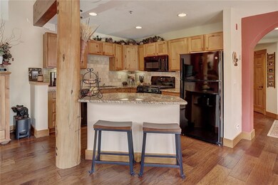 Kitchen island bar lowered to one level for better
