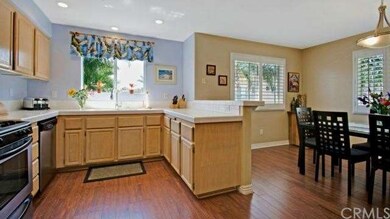 Gourmet Kitchen with breakfast bar over looking di