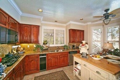 Highly upgraded kitchen includes Cherry wood finis