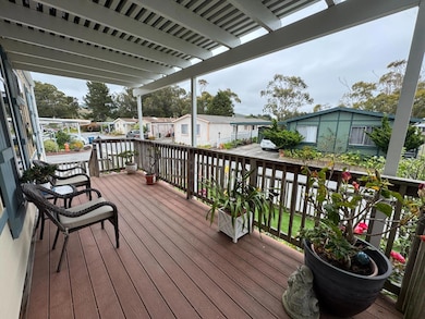 Front porch that is covered - keeps the rain off you!