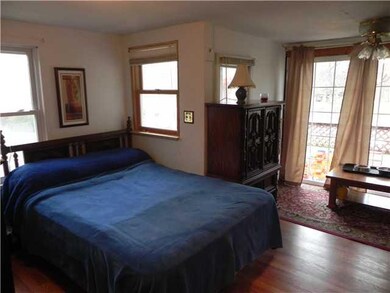 Living Room currently used as a 1st flr bdrm with 