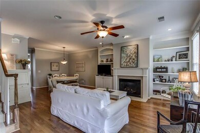 Gas fireplace w/built-ins on both sides.  Recessed lighting and ceiling fan.    SEE PHOTO TOUR LINK FOR ADDITIONAL PHOTOS