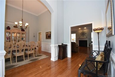 Gorgeous 2-story entryway. Gleaming hardwood floors. Beautiful molding!