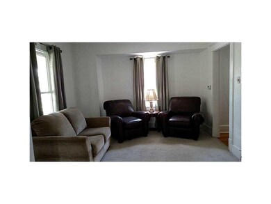 Living Room. May be hardwood under carpets